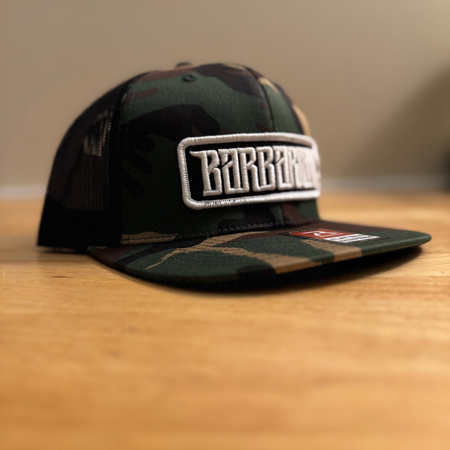 Flat Bill Trucker Hat [Camo/Black] Embroidered Patch