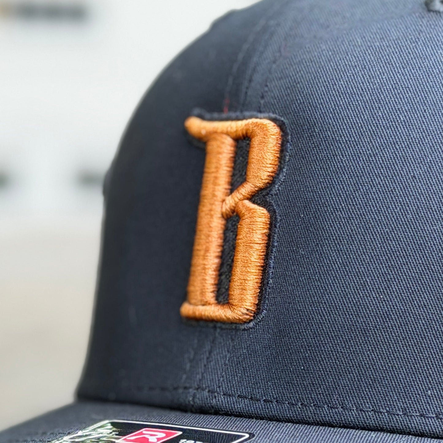 Barbarian "B" Trucker Hat [Richardson 112] – Black / Copper