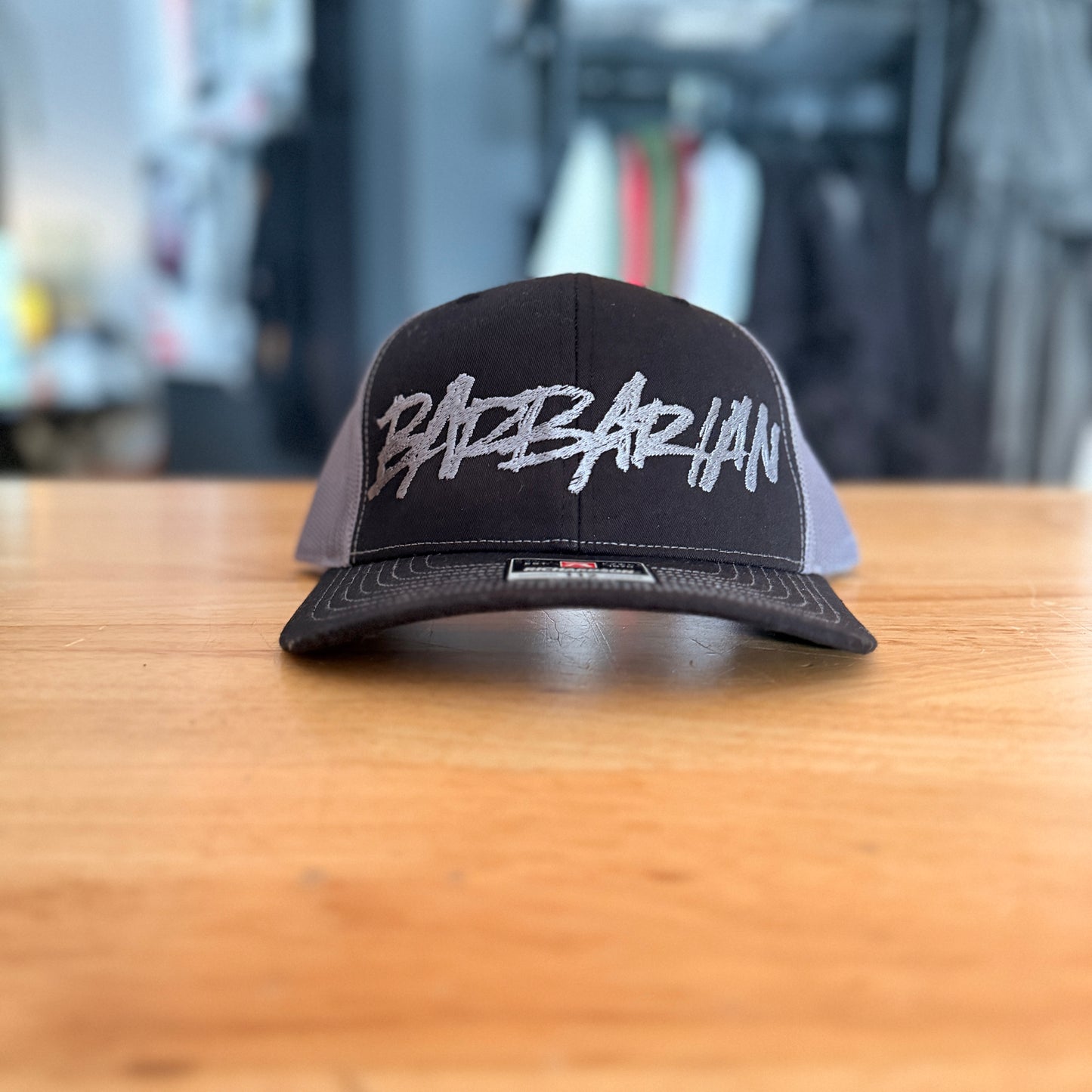 STRIFE Trucker Hat [Yupoong] – Black/Charcoal