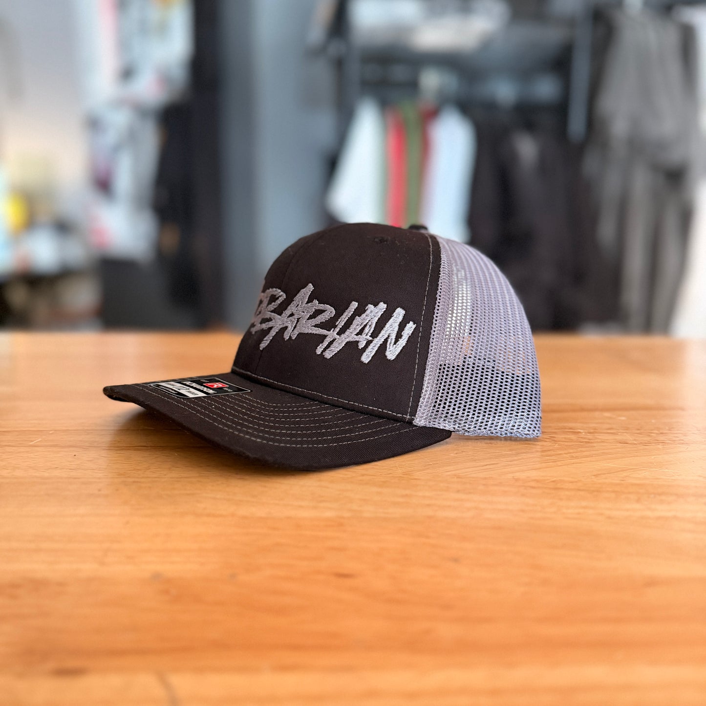 STRIFE Trucker Hat [Yupoong] – Black/Charcoal