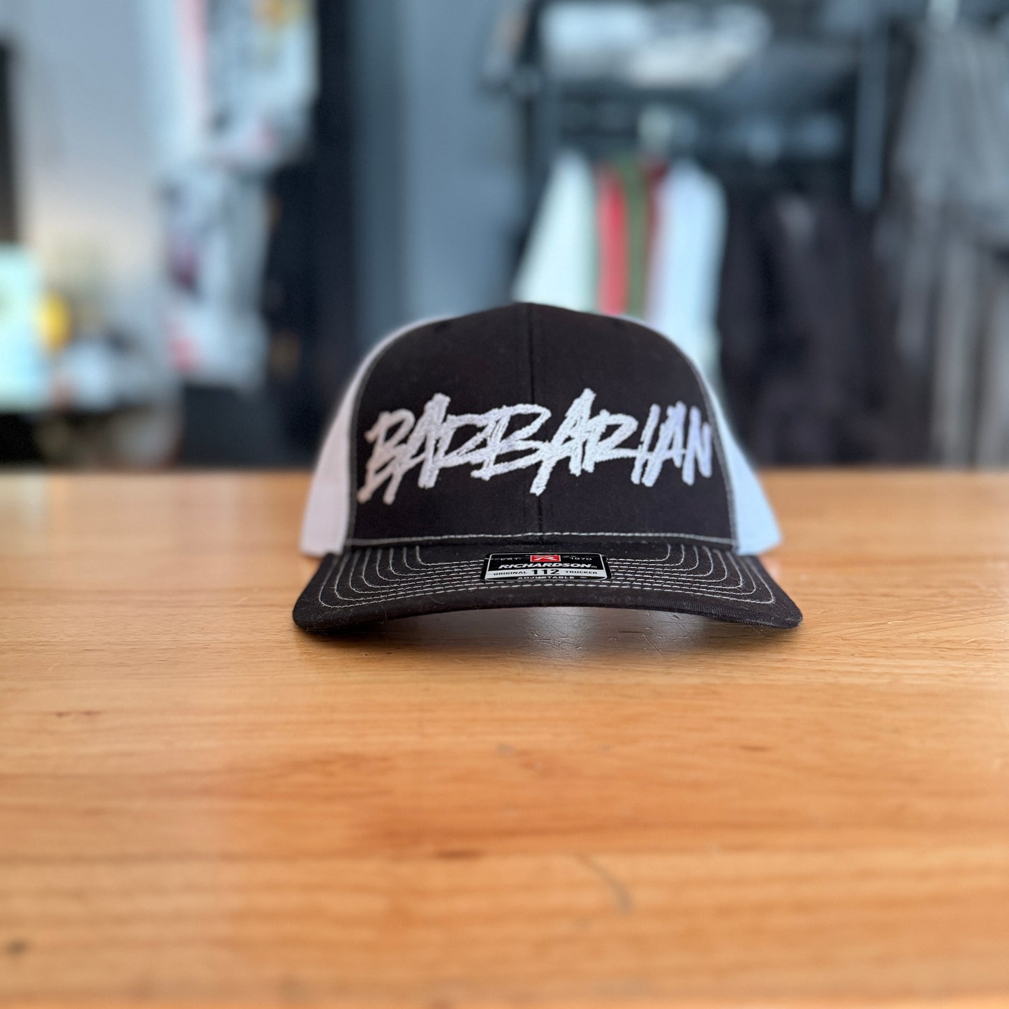 STRIFE Trucker Hat [Yupoong] – Black/White