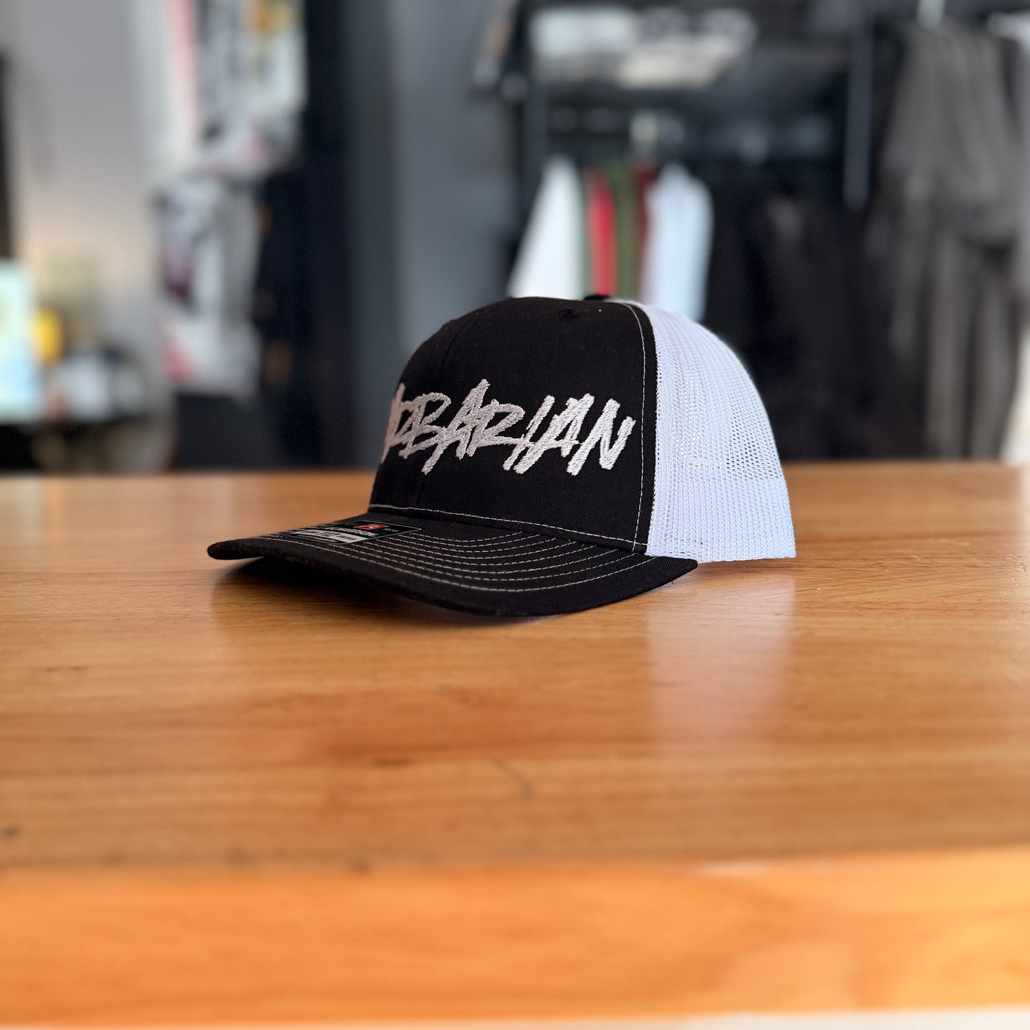 STRIFE Trucker Hat [Yupoong] – Black/White