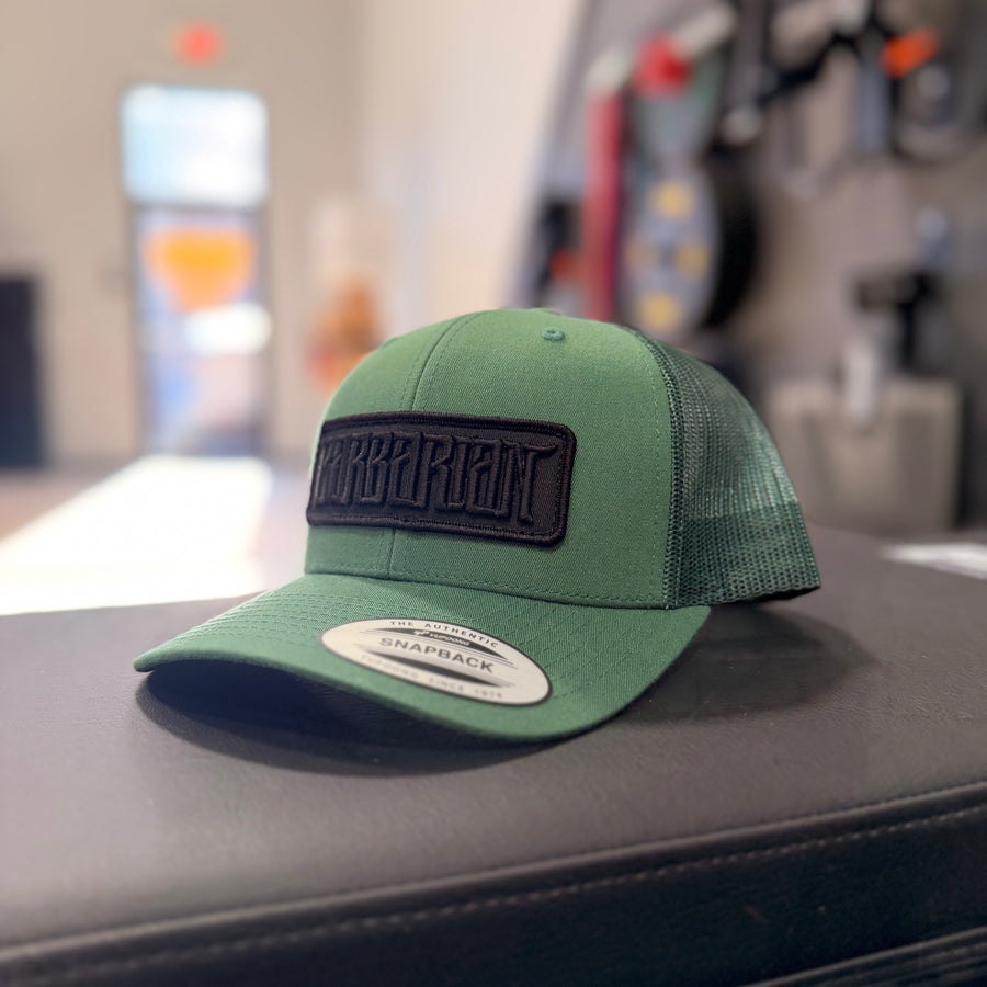 Trucker Hat [Yupoong] – Forest Green w/ Black Embroidered Patch