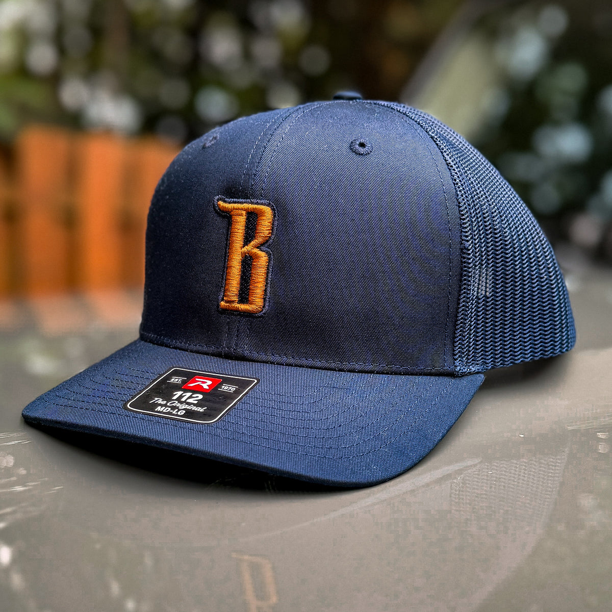 Barbarian "B" Trucker Hat [Richardson 112] – Navy / Copper