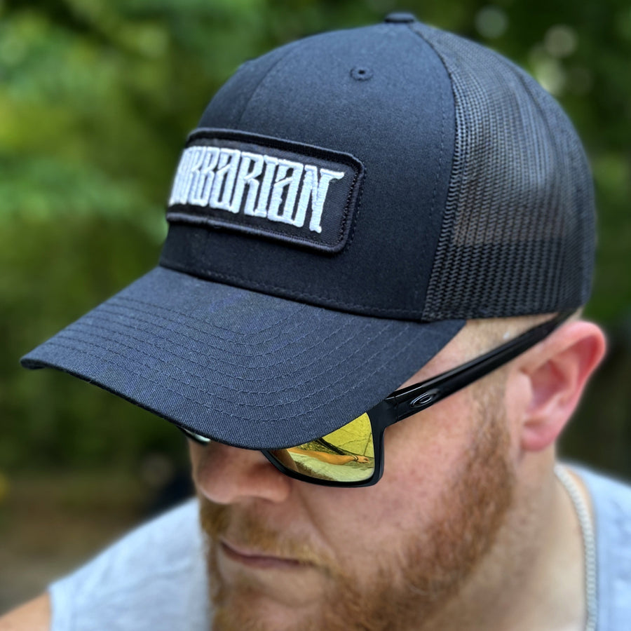 Trucker Hat [Black/Black] – Embroidered Patch
